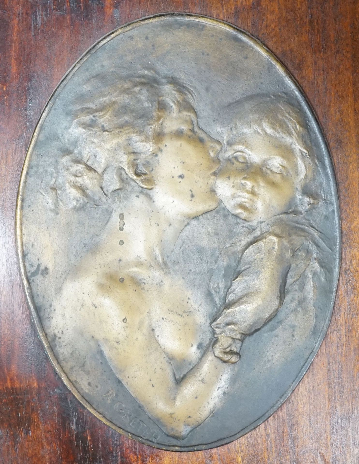 Robert Greter - oval relief plaque of a mother and child, mounted on board, plaque 26x19cm